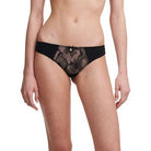 Tanga, elegant and seductive low-cut shape Leavers lace at the front, lined for more opacity Sides in matte knit and back in Leavers lace, delicately laying on the skin without cutting Elastic at the waist level Front decorated with a C-branded jewel on a bow Cut-out triangle at the back, adorned with an elastic and a jewel GOTS cotton gusset