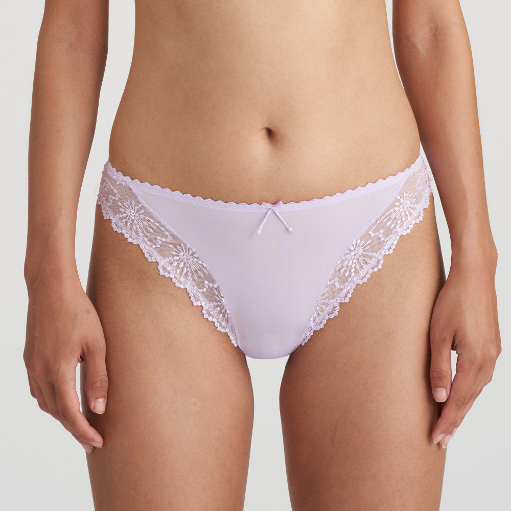 lavender brief with sheer embroidered fabric on the edges and covering the buttocks