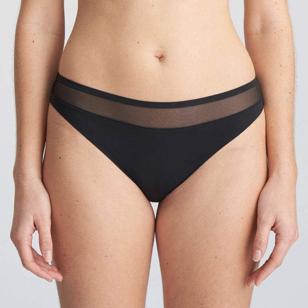 Solid black thong with mesh detailing at the topn