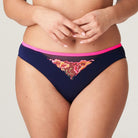 Navy blue brief with pink colour along the top and triangle of floral pattern in the centre