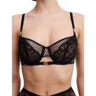 Half-cup underwired bra for an uplifted rounded breast and a seductive neckline Layering of double cups made of French Leavers lace, one with fishnet patterns, the other one made of Chantilly floral lace Cups lined for more support.  Centre-front decorated with a graphic cut-out and an exclusive "X" jewel. The back is made of tulle, adorned with two graphic lace inlays. Ribbed straps decorated with an exclusive double "X" jewel at the front and adjustable at the back