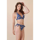 pleated seams and the removable moulded cups provide an elegant neckline for smaller breasts
